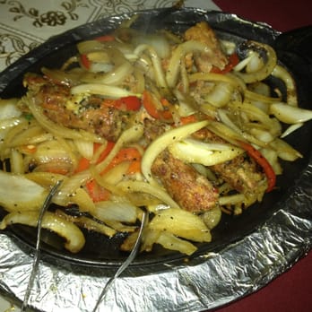 Bombay Grill Austin signature dishes Tandoori ChickenChicken MakhaniVegetable Korma